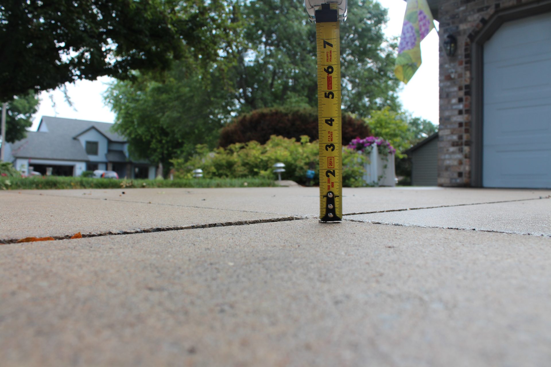 Walkway restored level with polyurethane foam — no slab removal